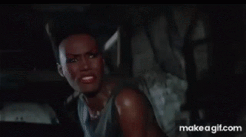 Woman In Tank Top Making Funny Face GIF