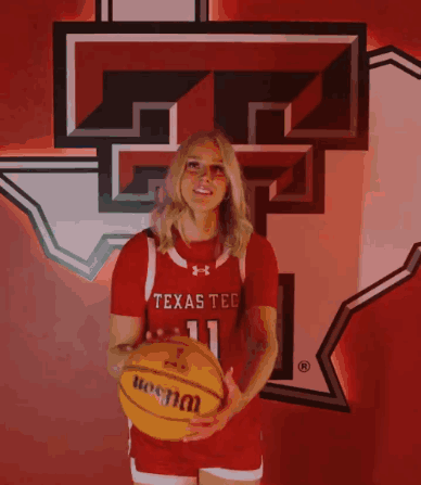 Woman in Texas Tech Jersey with Logo