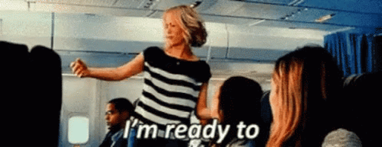 Woman In The Airplane Ready To Party GIF