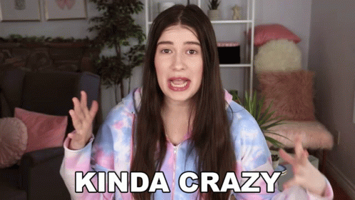 Woman In Tie Dye Sweatshirt Making Funny Face GIF