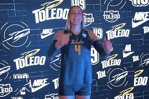 Woman in Toledo 4 Jersey Giving Thumbs Up