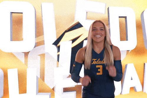 Woman in Toledo Jersey Number 3 Smiling