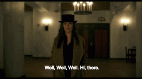 Woman In Top Hat Says Well Well Well GIF