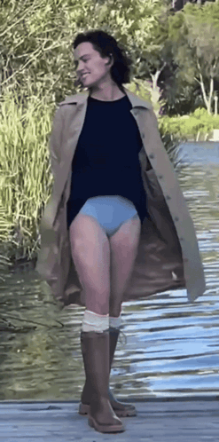 Woman in Trench Coat and Blue Underwear