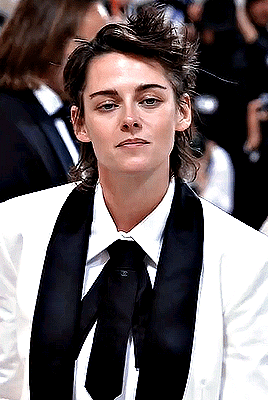 Woman in Tuxedo and Chanel Logo