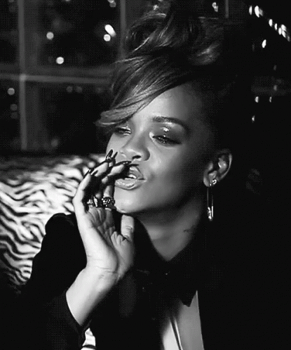 Woman In Tuxedo Smoking Cigarette GIF