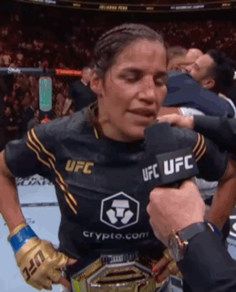 Woman in UFC Shirt Being Interviewed