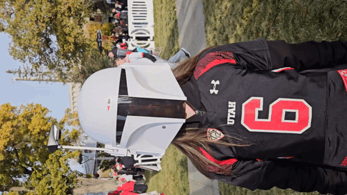 Woman in Utah Jersey Number 6