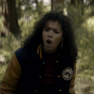 Woman in Varsity Jacket Making Funny Face