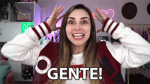 Woman in Varsity Jacket Making Funny Face Saying Gente