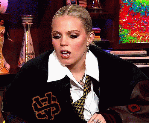 Woman in Varsity Jacket With Letter S