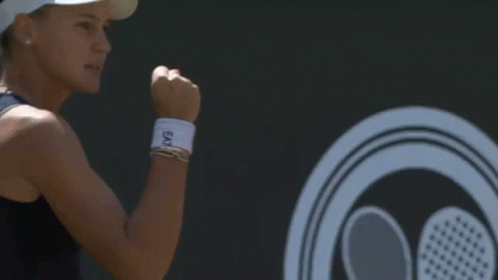 Woman In Visor Screaming With Fist In Air Tennis GIF