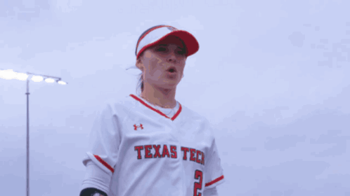 Woman in Visor with Letter T