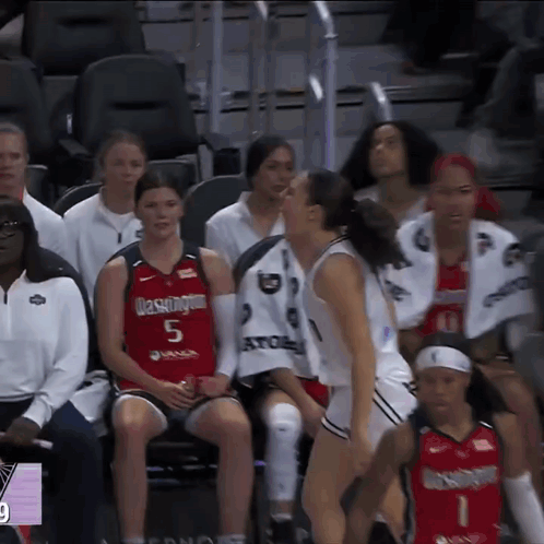 Woman In Washington Jersey Sitting On Bench GIF