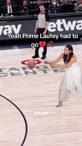 Woman in Wedding Dress Holding Basketball on Court