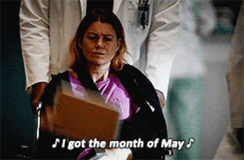 Woman In Wheelchair Being Pushed By Doctor GIF