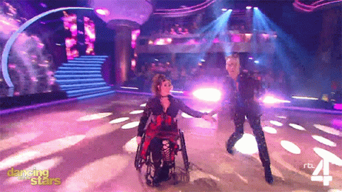 Woman in Wheelchair Dancing With Man on Dancing Stars