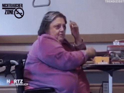 Woman in Wheelchair Smoking in Nichtraucher Zone