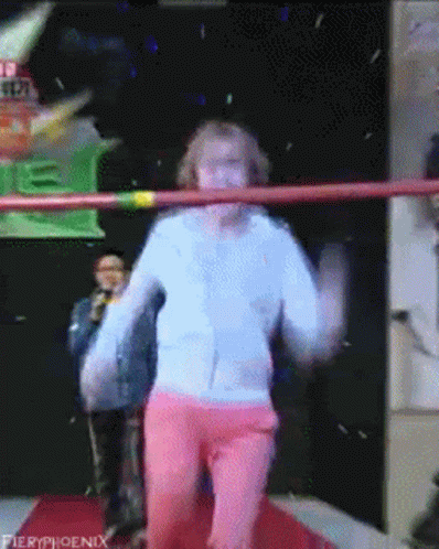 Woman in White and Pink Dancing in Fieryphoenix Ring