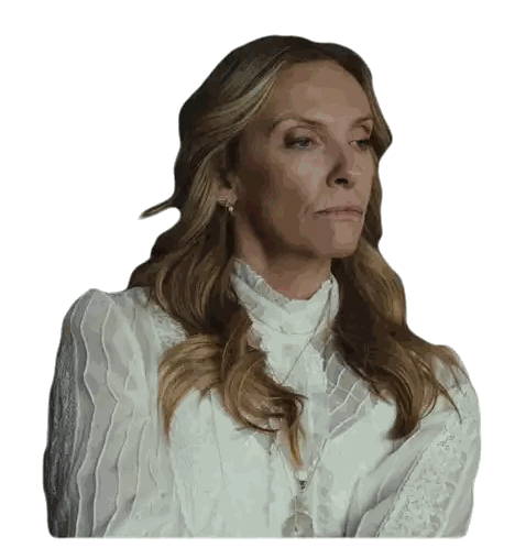 Woman in White Blouse and Earrings