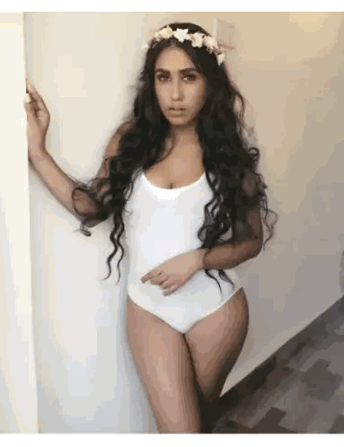 Woman in White Bodysuit and Flower Crown