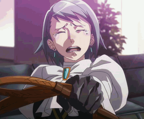 Woman In White Cape Crying Holding Wooden Stick GIF