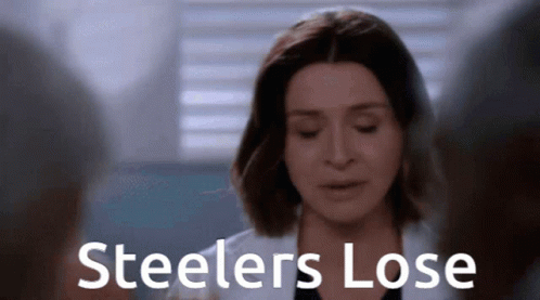 Woman in White Coat Steelers Lose
