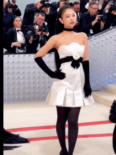 Woman in White Dress and Black Gloves