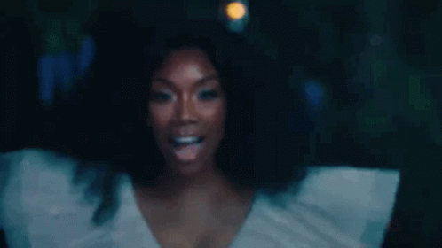 Woman In White Dress Arms Outstretched Dark Room GIF
