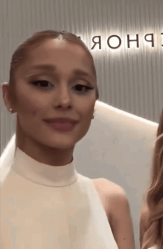 Woman In White Dress By Sign Saying Яоня GIF