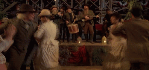 Woman In White Dress Dancing In Crowd GIF