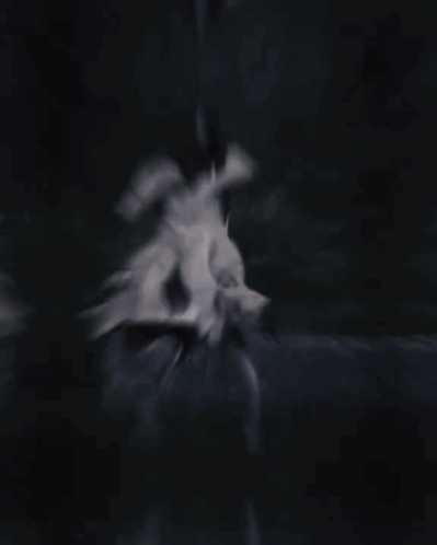Woman In White Dress Dancing In Dark Forest GIF