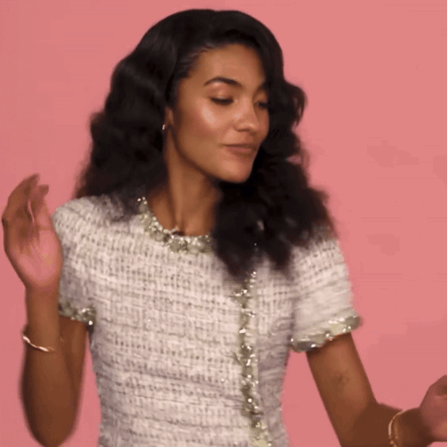 Woman In White Dress Dancing With Hands Up GIF