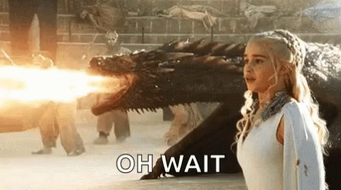 Woman in White Dress Facing Fire-Breathing Dragon