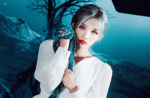 Woman In White Dress Holding Blue Rope GIF