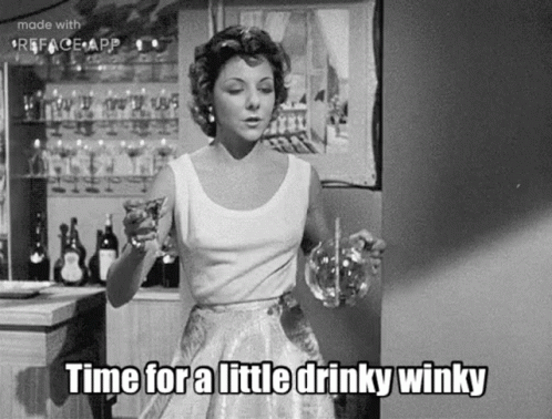 Woman in White Dress Holding Water and Wine