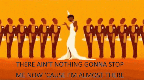 Woman In White Dress In Front Of Suited Men GIF