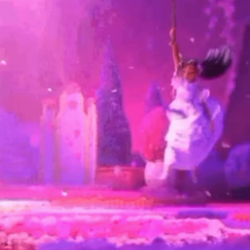 Woman In White Dress Jumping Holding Purple Object GIF