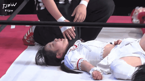 Woman in White Dress Laying in Wrestling Ring #TJPW