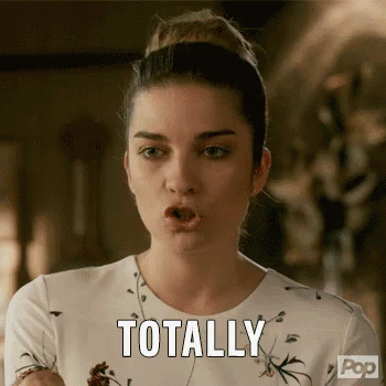 Woman in White Dress Making Funny Face Saying Totally