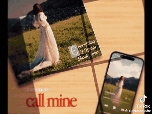 Woman in White Dress Next to Phone Saying Call Mine