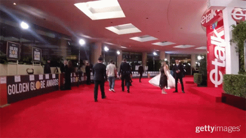 Woman in White Dress on Red Carpet Golden Globe Awards