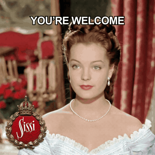 Woman in White Dress Saying Youre Welcome