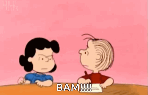 Woman In White Dress Says Bam By Chain Link Fence GIF