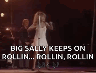 Woman in White Dress Singing and Dancing