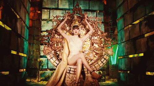 Woman in White Dress Sitting on Throne With Crossed Legs