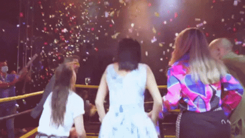 Woman in White Dress Watching Confetti Fall