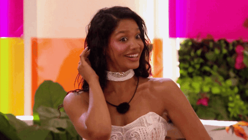 Woman in White Dress with Choker Smiling