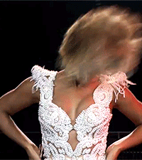 Woman In White Dress With Feathers GIF