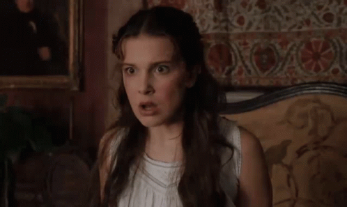 Woman In White Dress With Funny Face GIF